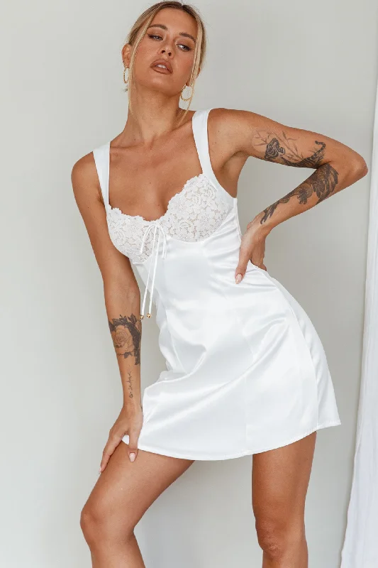 Statement-making glamourTi Amo Lace Bust Mini Dress White