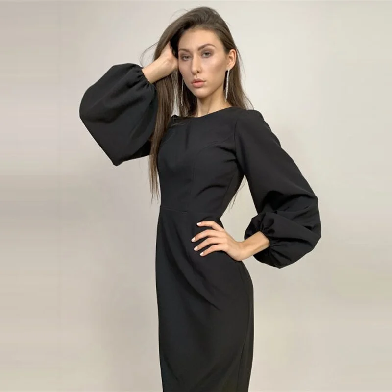 Understated eleganceSlit O-Neck Backless Midi Dress