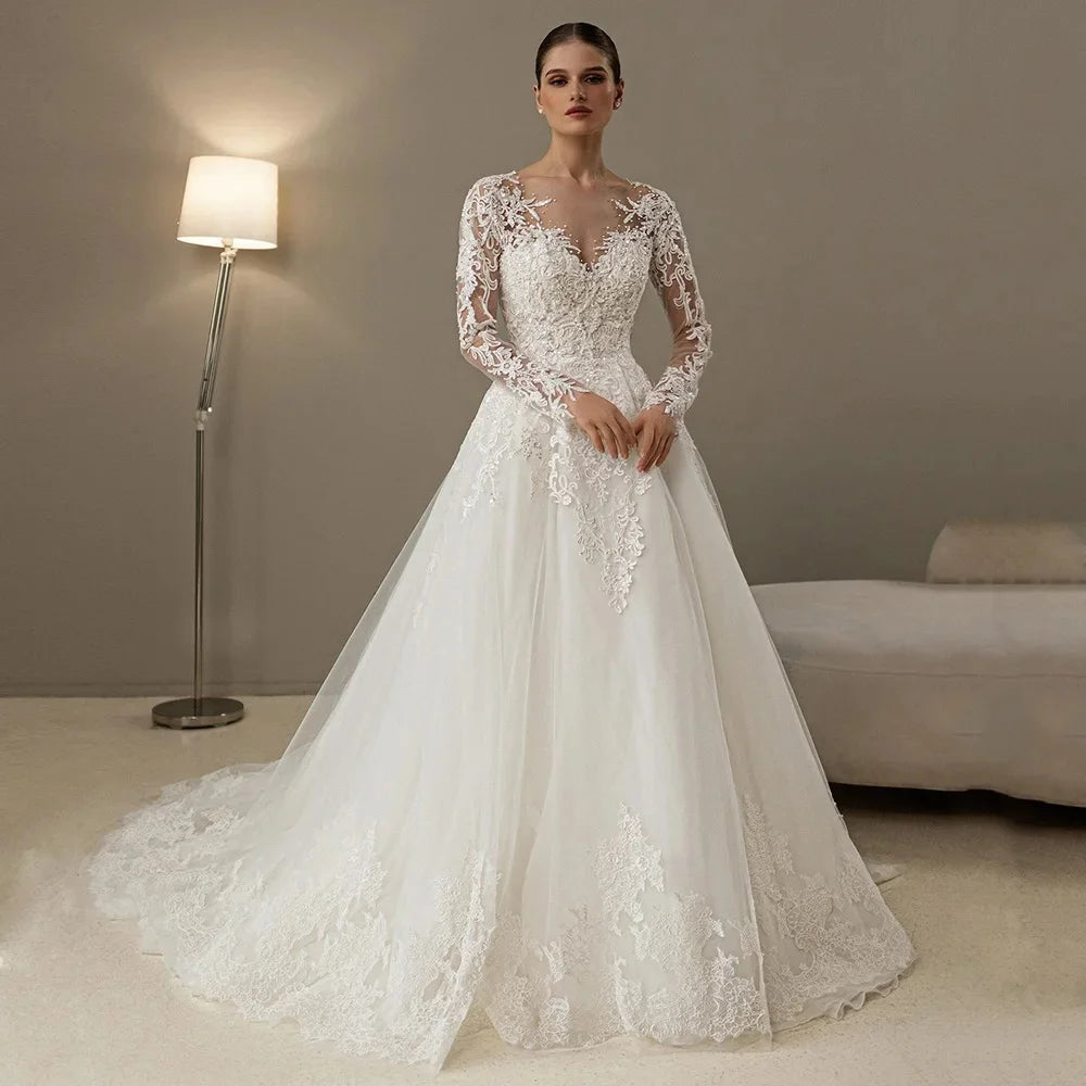 Effortlessly enchantingLong Sleeves Vestidos De Novia Sheer Scoop Neck Pearls Beading Lace Effortlessly enchantingLong Sleeves Vestidos De Novia Sheer Scoop Neck Pearls Beading Lace